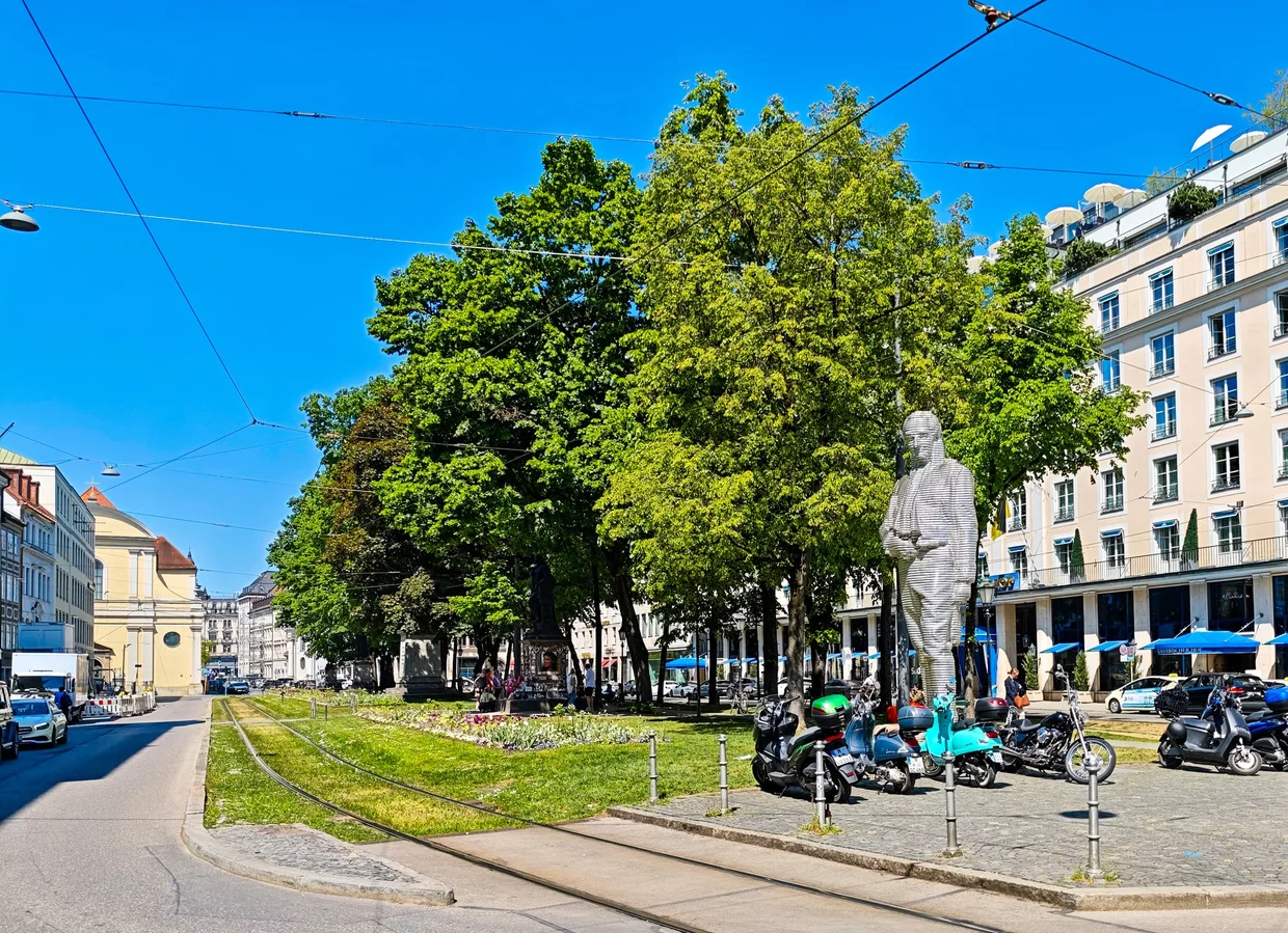 Promenadeplatz with the Orlando di Lasso statue and tree-lined boulevard