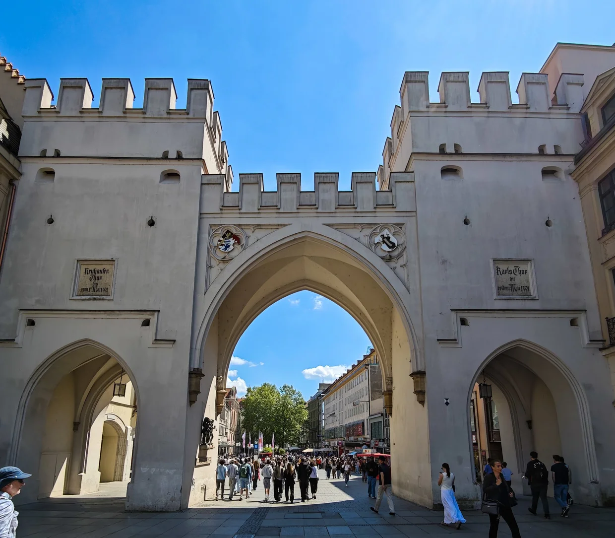 Karlstor medieval gate with two crenellated towers and central archway at Stachus