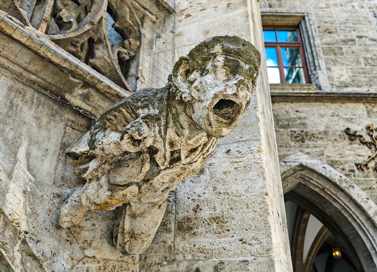 Stone gargoyle on the Neues Rathaus facade