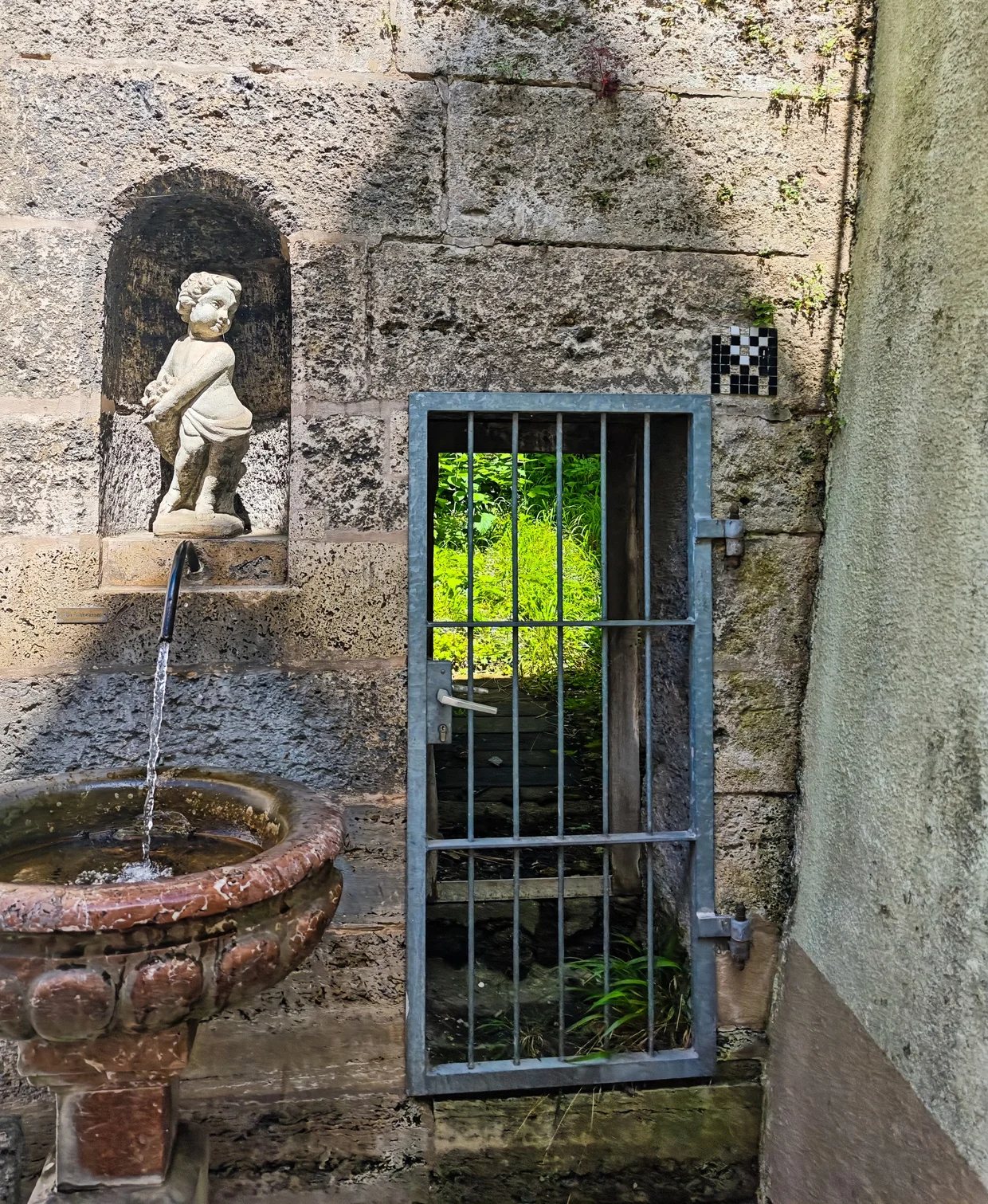 Cherub putto fountain detail