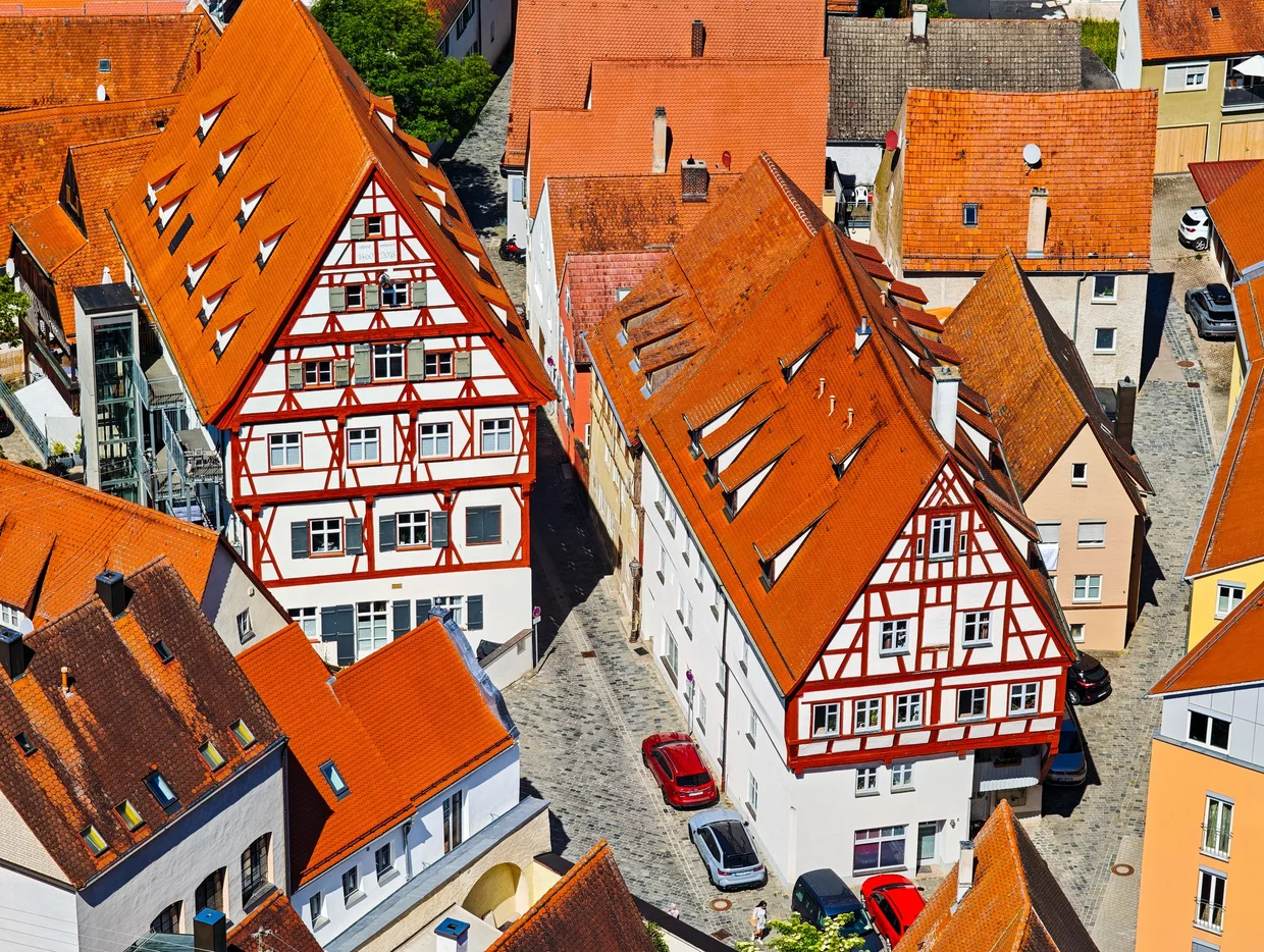 Two big half-timbered gable houses seen from above