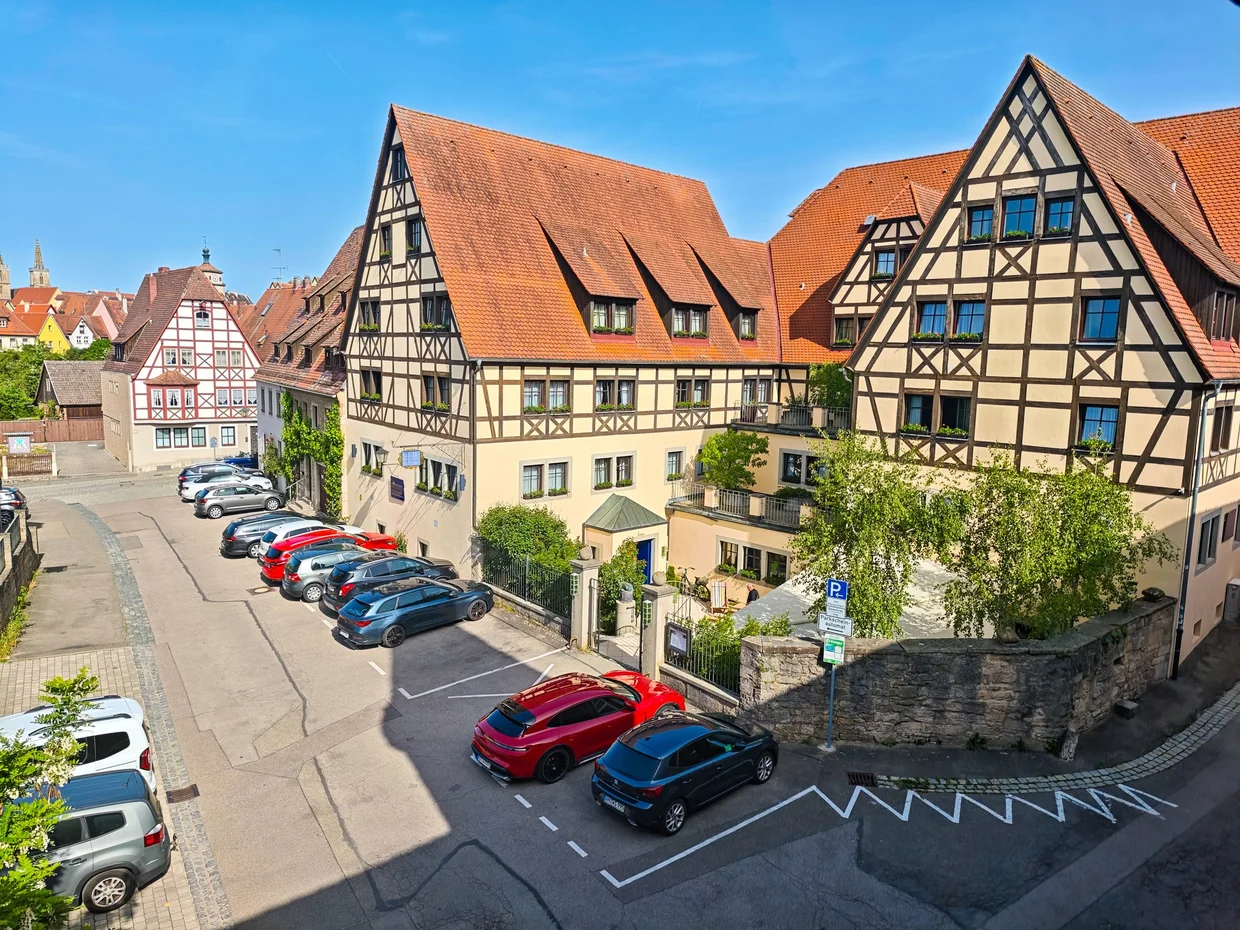 Half-timbered hotels around the inner parking square