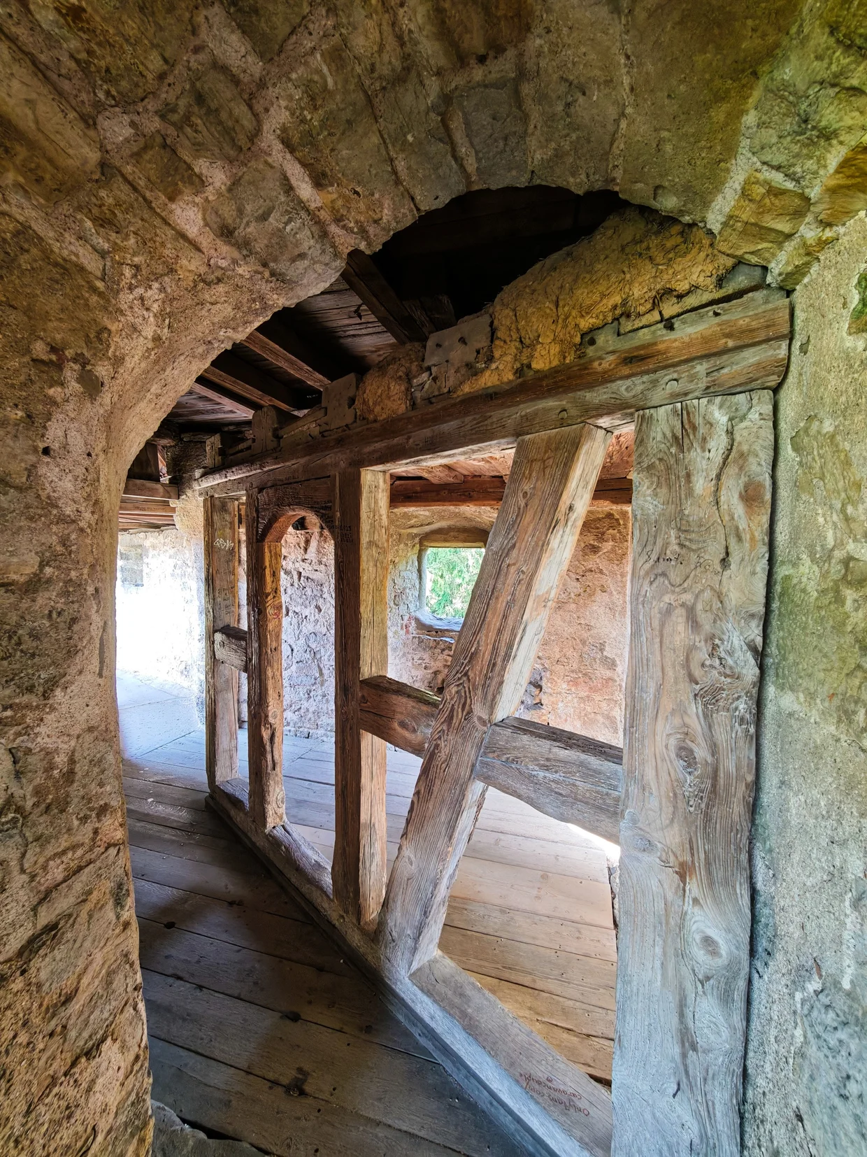 Inside a stone arched gate-house
