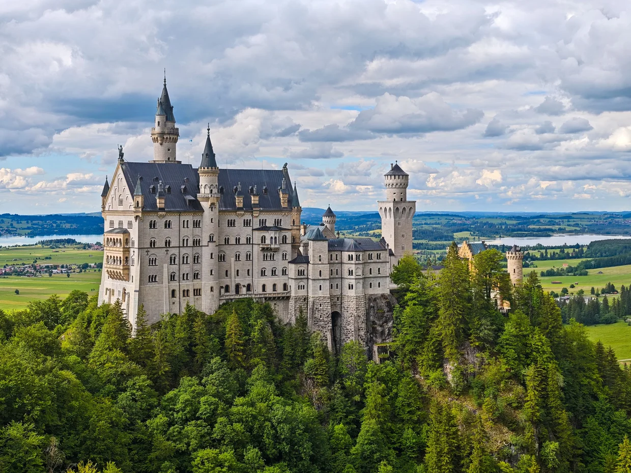 A telephoto pull of Neuschwanstein from the bridge