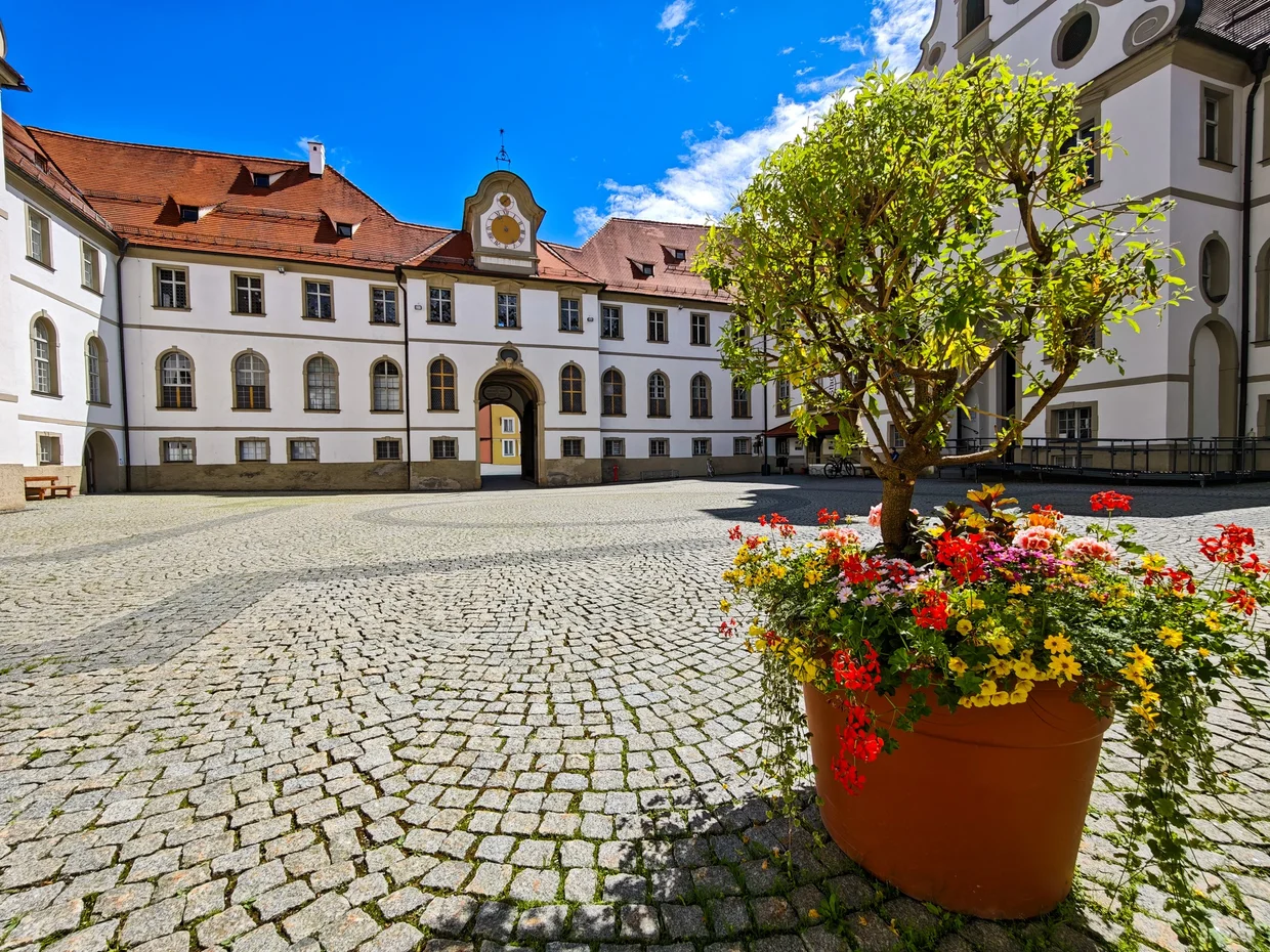 The St. Mang courtyard with the basilica tower to the right