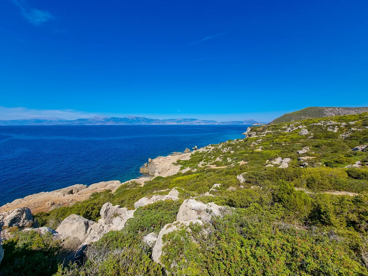 Rocky coast with turquoise Mediterranean water stretching into the distance