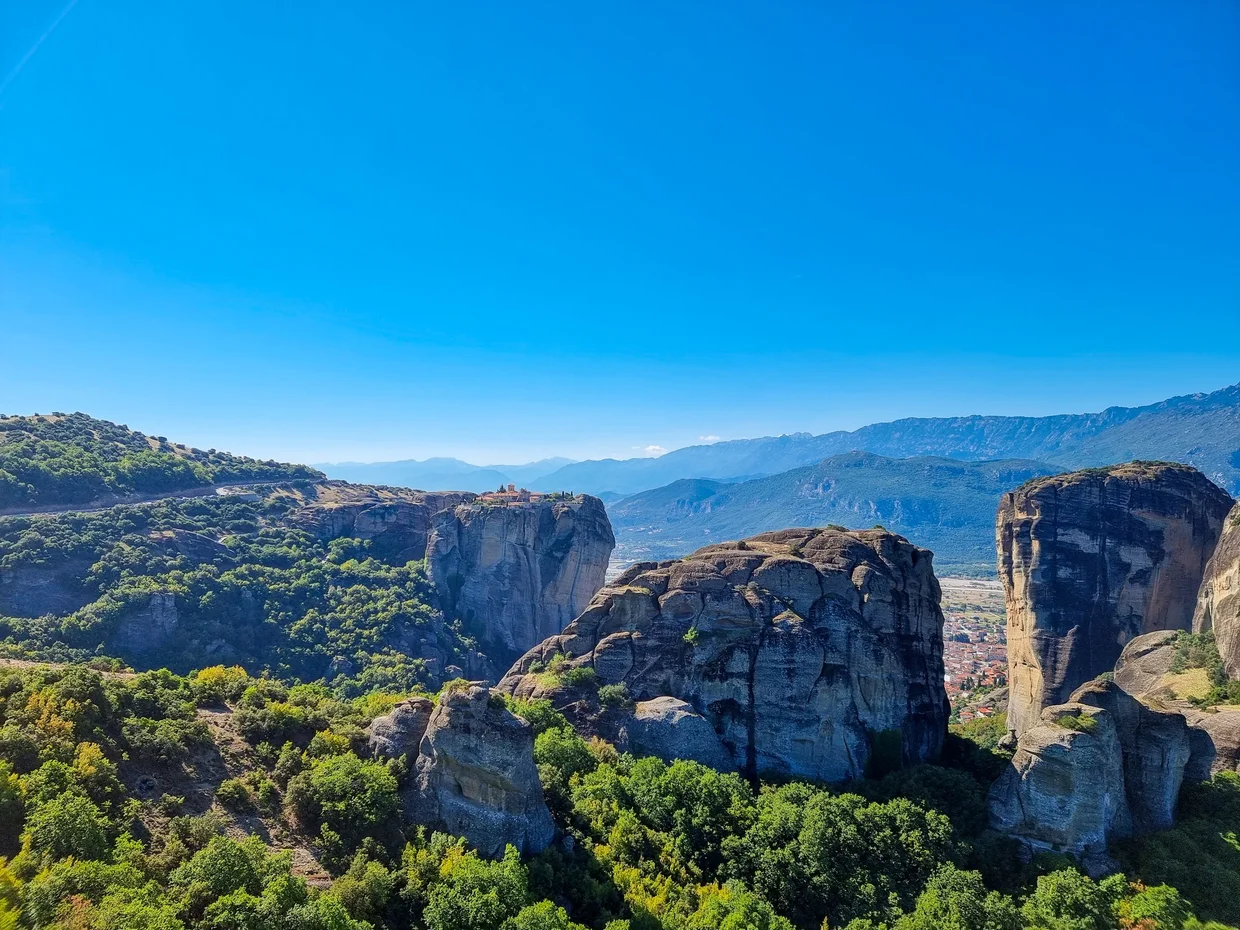 Morning view of the rock pillars with a distant monastery