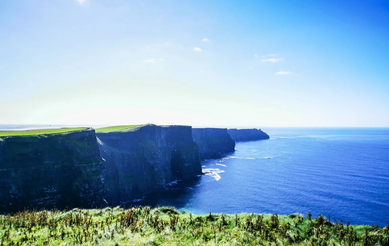 The Cliffs of Moher dropping sheer into the Atlantic in County Clare