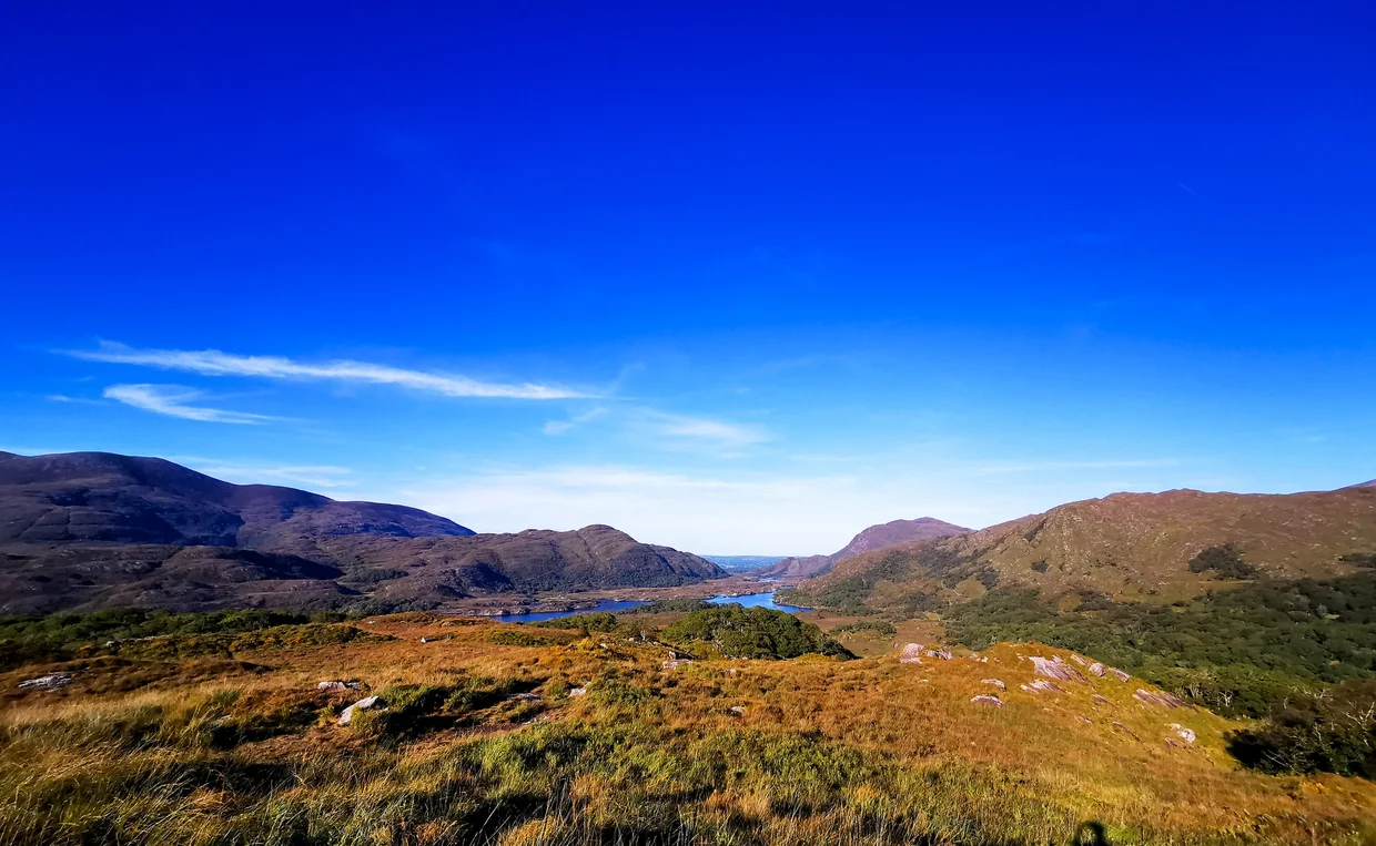 The Upper Lake threading through autumn mountain slopes in Killarney National Park
