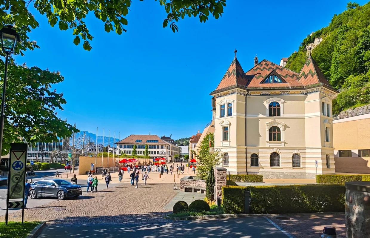 Same square from a different angle, with Vaduz Castle visible up on the cliff