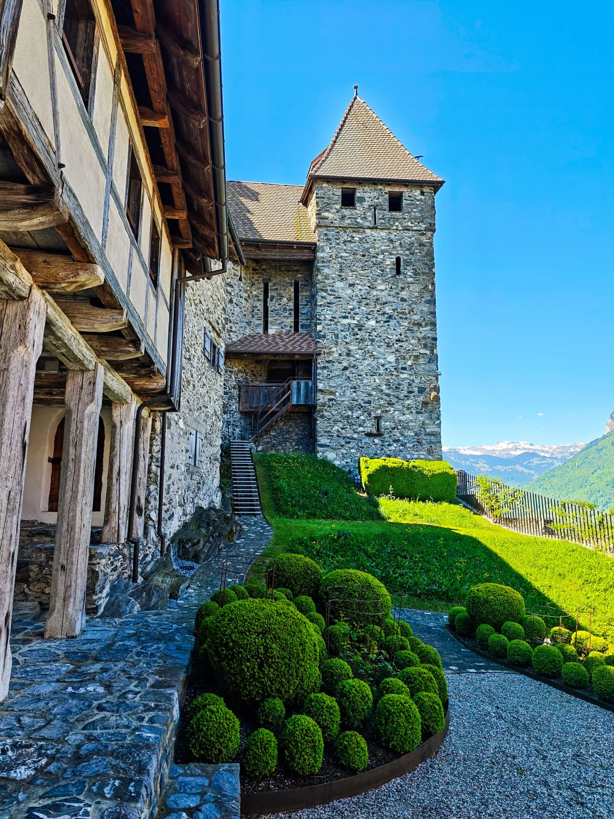 Inner courtyard with topiary and timber beams