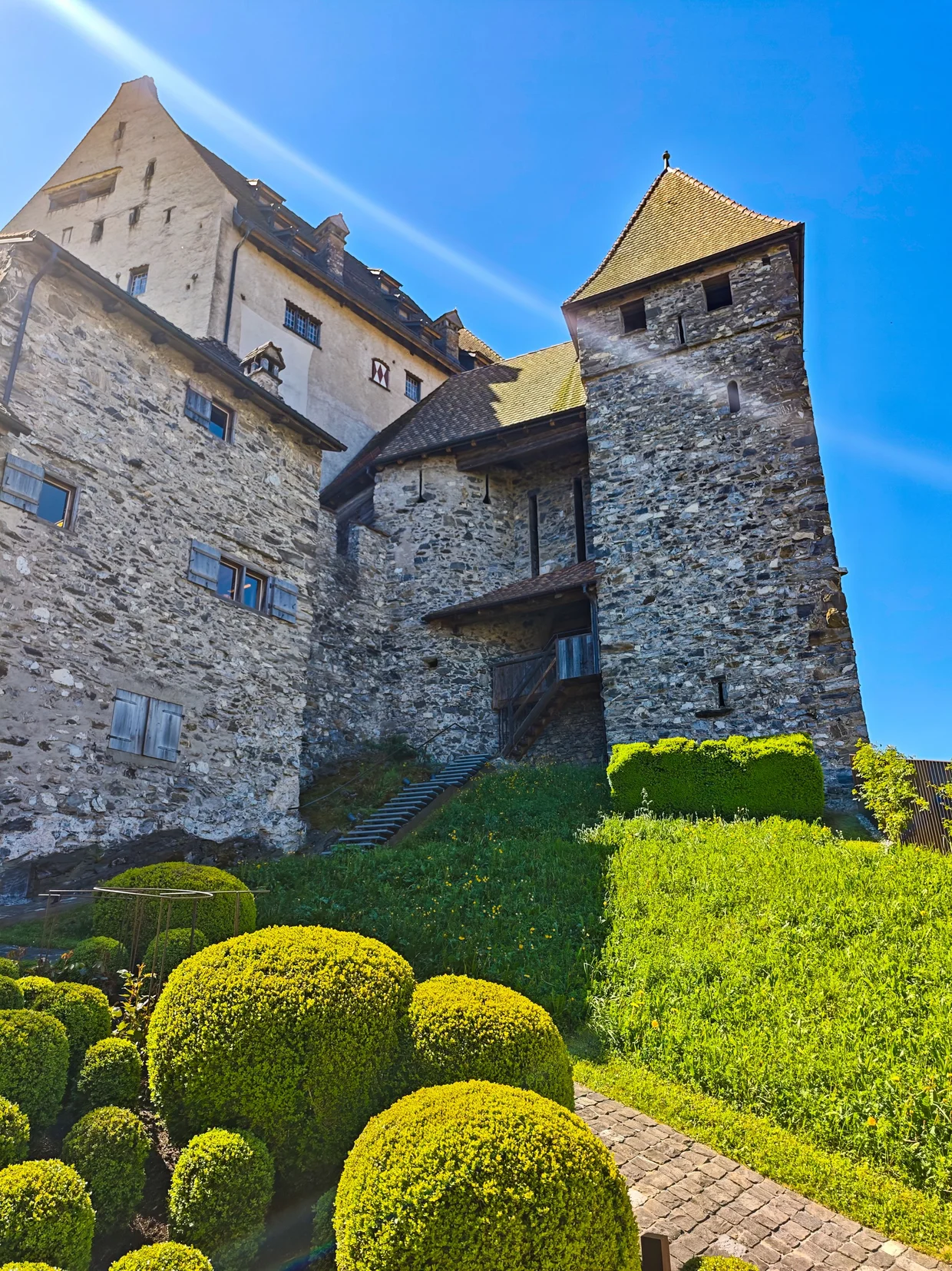 Castle keep with topiary garden in the foreground