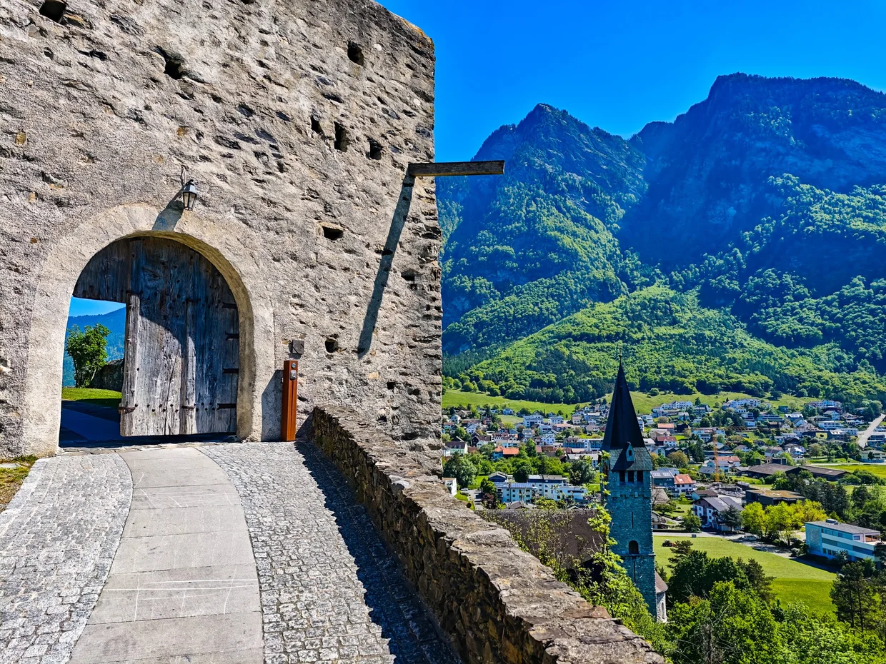 Castle gate from inside, looking out at Balzers and the mountains