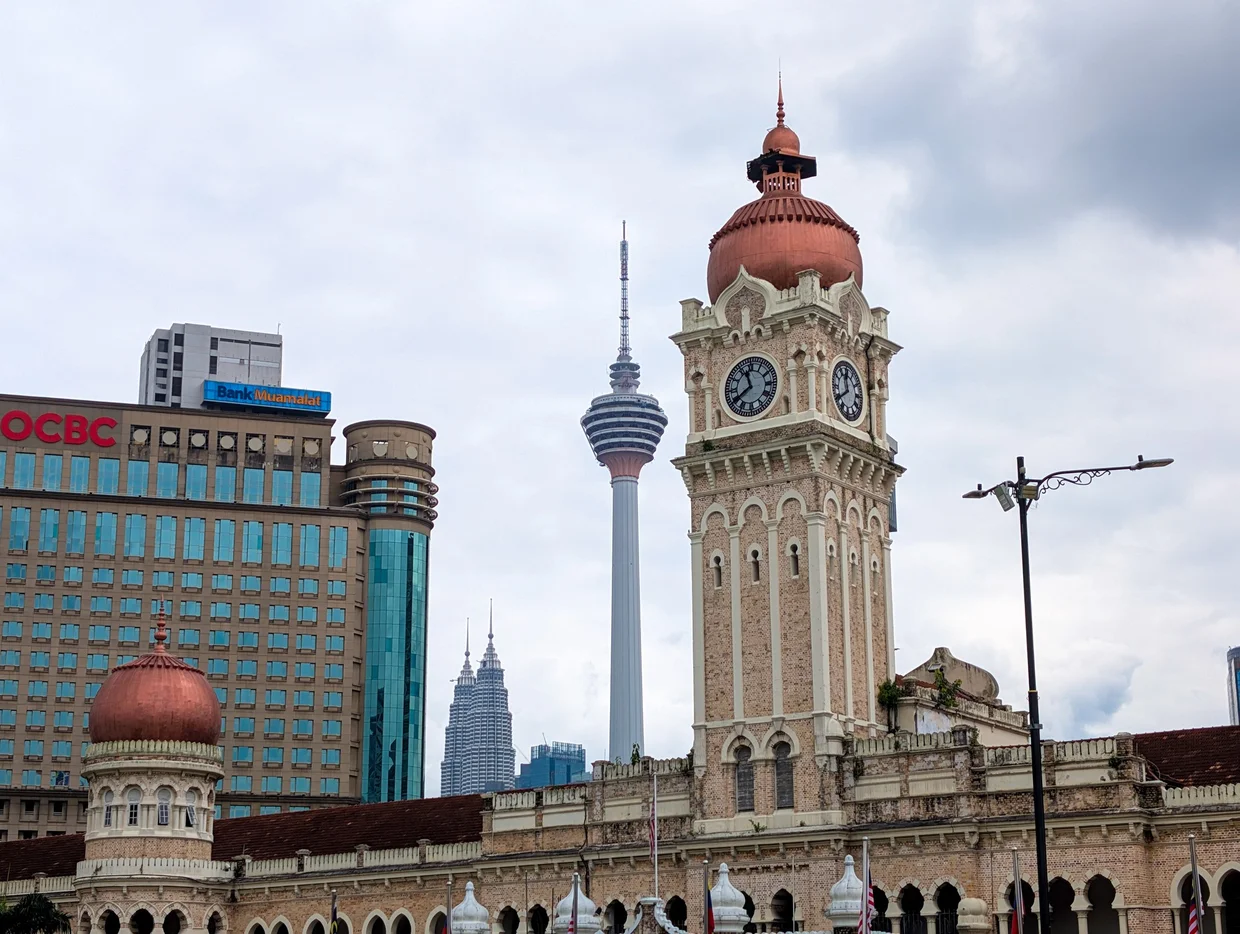 Sultan Abdul Samad clock tower with KL Tower behind