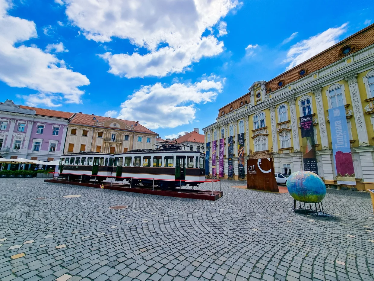 Tram and old buildings in the center of Timișoara