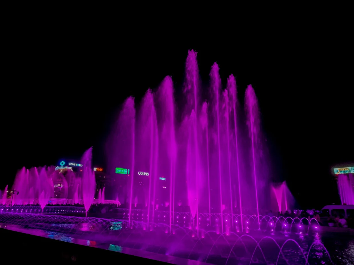 The Unirii fountains lit up at night
