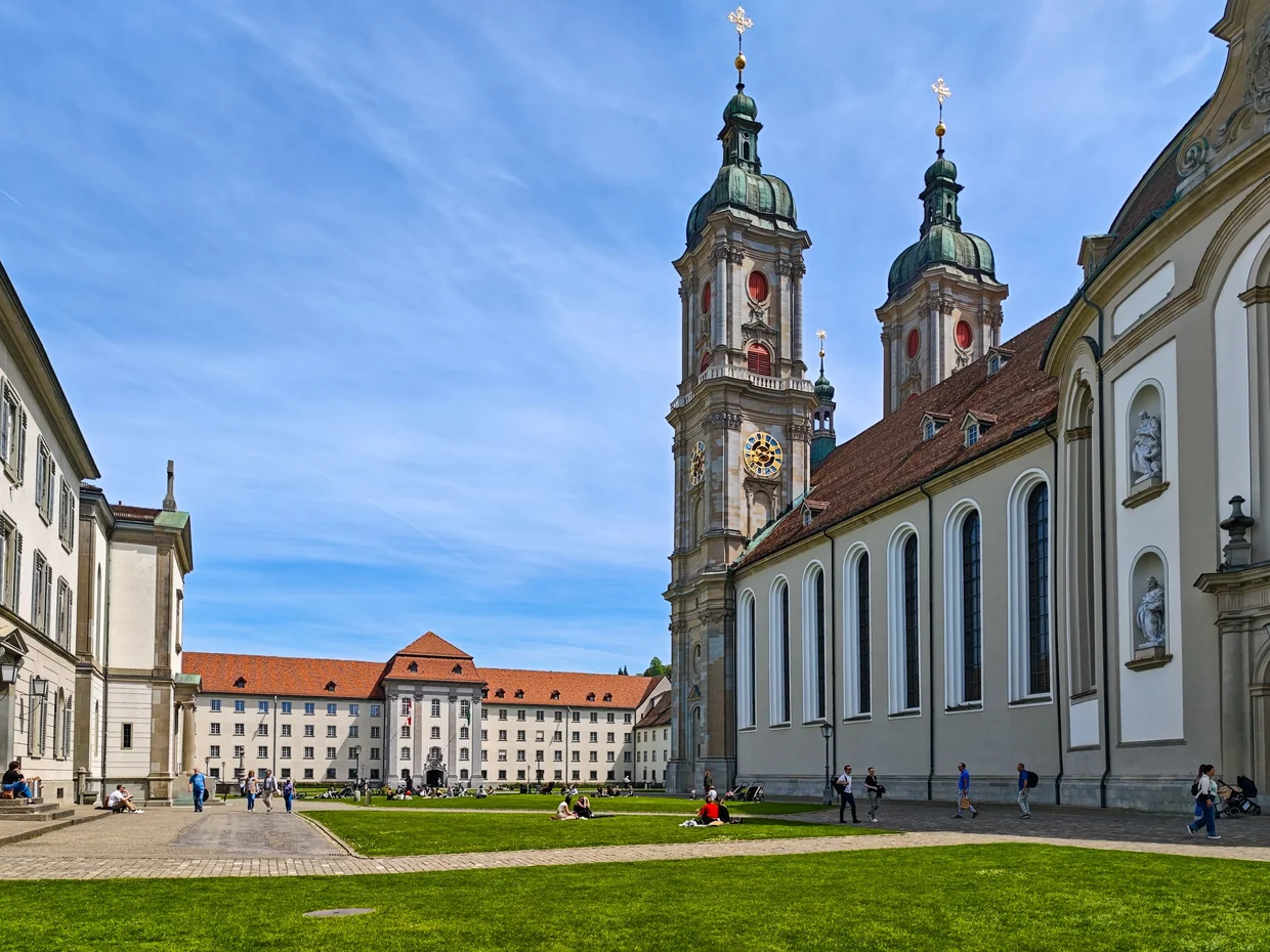 Cathedral towers from the side with the abbey grounds in front