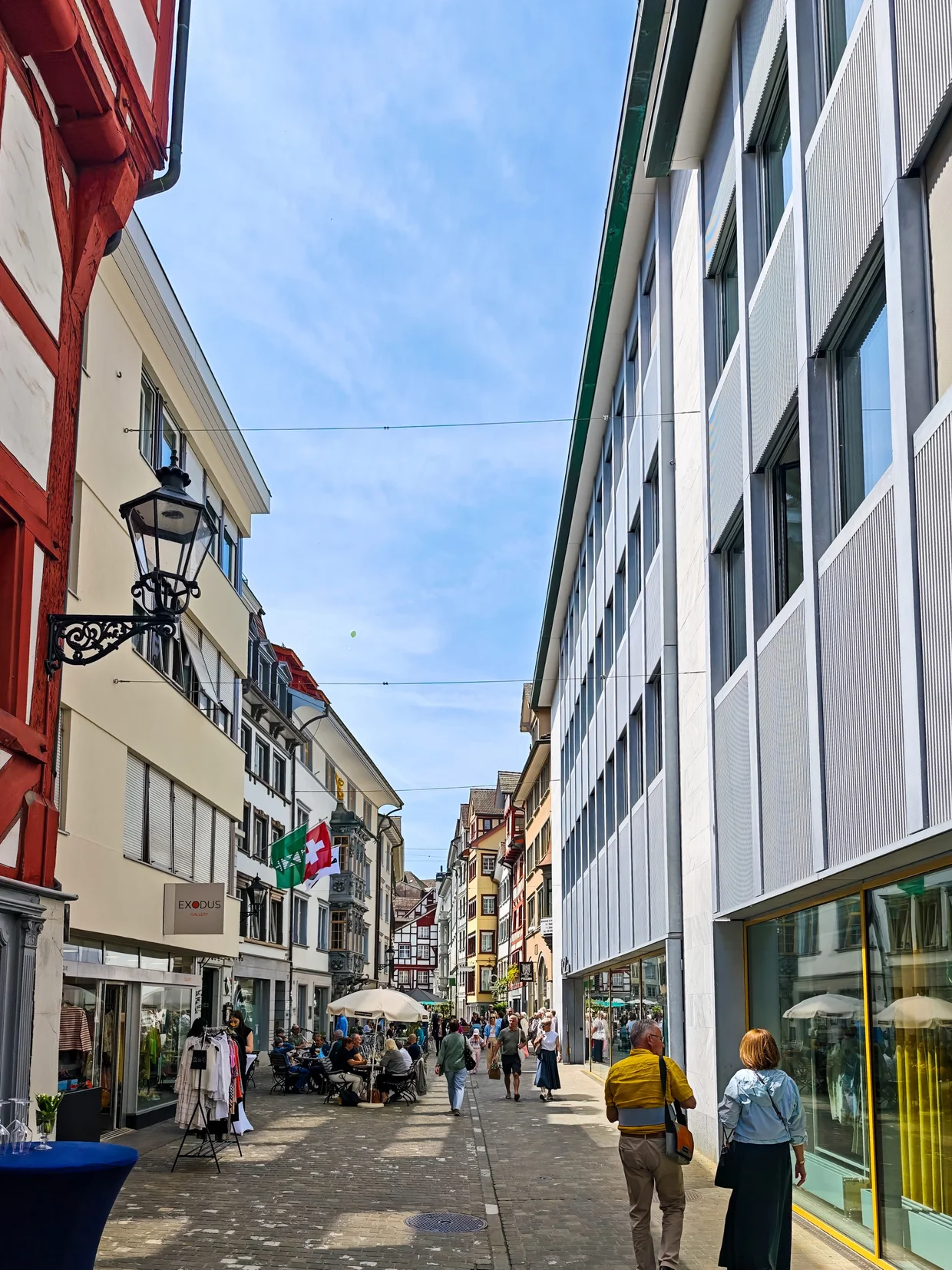 Old town pedestrian street with painted half-timbered house