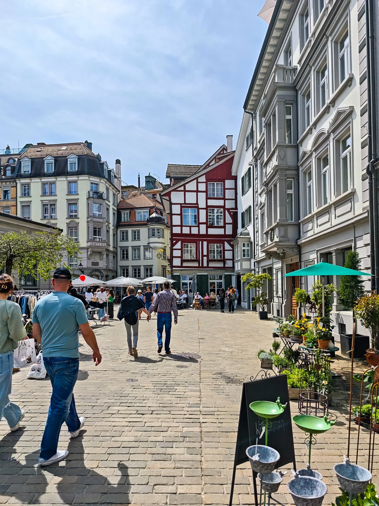 Pedestrian street with a red half-timbered house