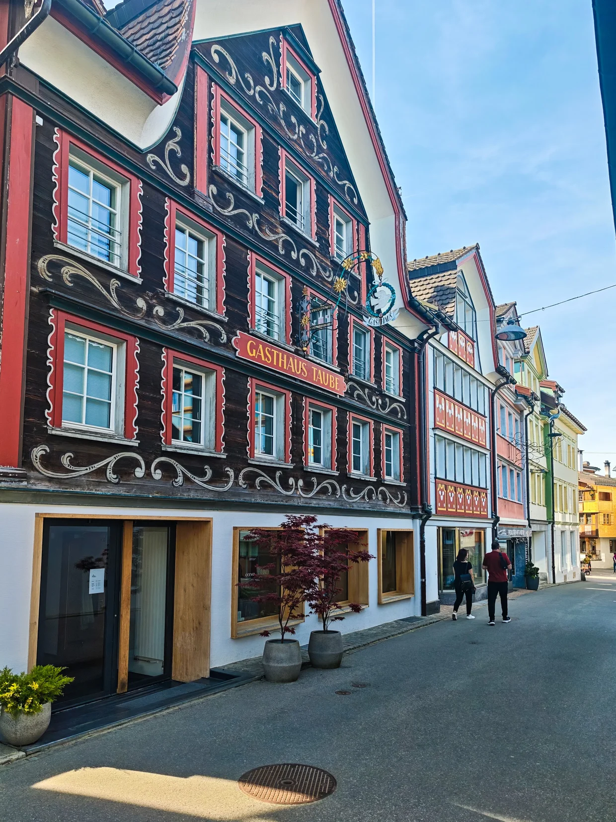 Gasthaus Taube, an old red-painted Swiss inn on Hauptgasse